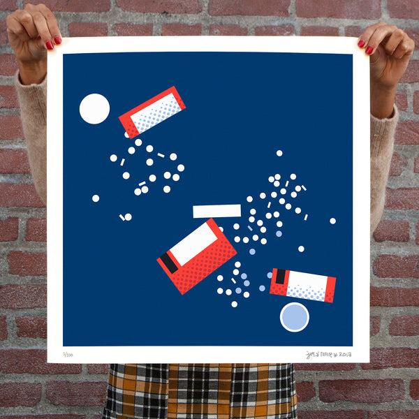 three pill bottles open with spilt pills